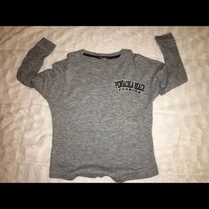 black long sleeve and orange tank. PENSACOLA